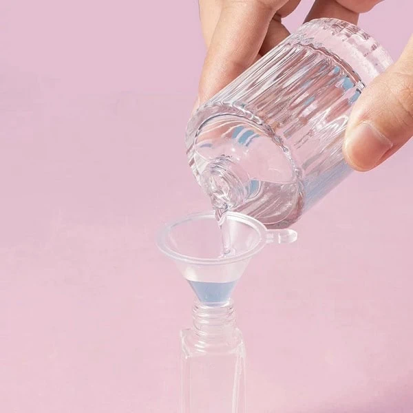 How to refill a perfume bottle with a funnel